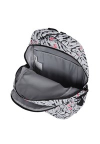 Zaino con motivo zebra bianco e nero, accenti rosa, ampio interno grigio, doppia cerniera, spallacci imbottiti e una tasca laterale.