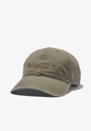 Casquette de baseball kaki avec une visière incurvée et un logo Timberland brodé ainsi qu’un symbole d’arbre au centre avant.