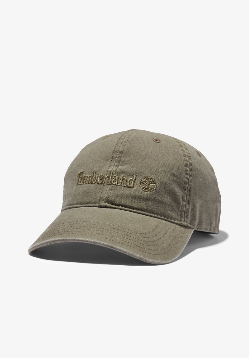 Casquette de baseball kaki avec une visière incurvée et un logo Timberland brodé ainsi qu’un symbole d’arbre au centre avant.