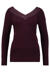 Burgundy sweater with long sleeves, v-neckline adorned with metallic studs, textured ribbed hem and cuffs, soft fabric.
