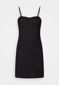 Robe noire ajustée avec de fines bretelles spaghetti, un corsage structuré et une silhouette droite. Tissu lisse avec des coutures verticales.