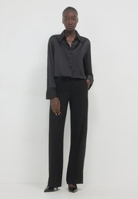Calliope PALAZZO BANDA STRASS - Pantaloni - ultrablack