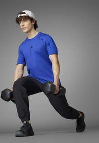 adidas Performance POWER WORKOUT - T-shirt till träning - semi lucid blue black