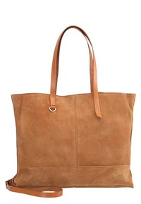 Bruine suède tote bag met bijpassende leren handvatten en een afneembare schouderband. Heeft een strak ontwerp en verticale stiksels aan de voorkant.