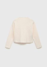 Kremna skrajšana bluza z dolgimi rokavi, rebrasti teksturi in okroglo ovratnico, prikazana s hrbtne strani.