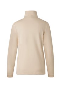 Beżowa koszula z długim rękawem i wysokim kołnierzem, charakteryzująca się gładką, miękką fakturą i prostym wzornictwem. Brak widocznych wzorów lub akcentów.