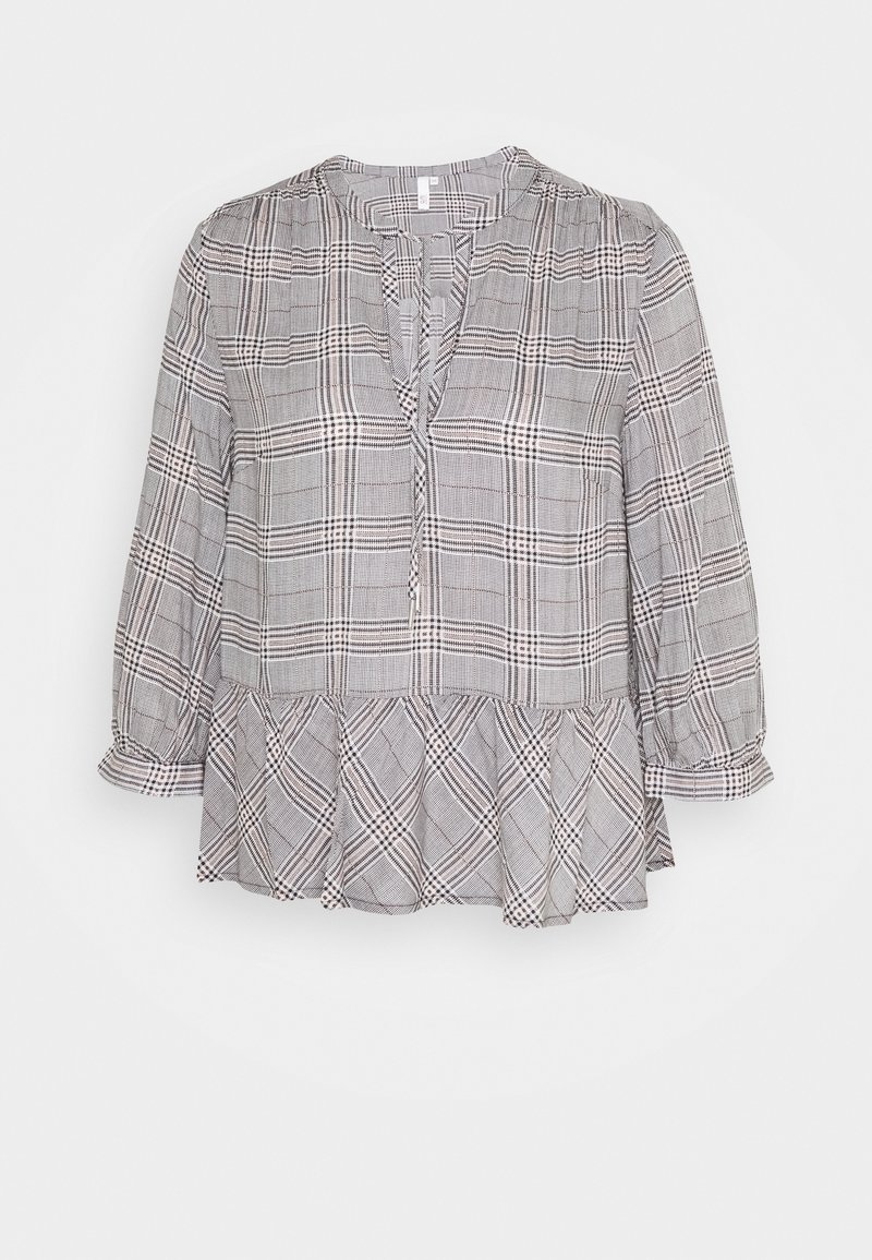 Blouse à manches longues à carreaux gris et blanc avec fente en V au col et ourlet à volants, tissu léger et coupe ample.