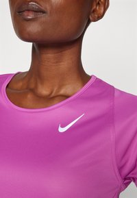 Nike Performance FAST TOP - Sportovní tričko - hot fuchsia