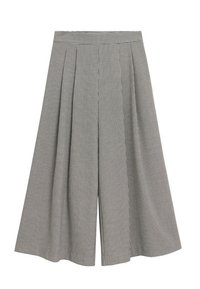 Culottes à carreaux noir et blanc en tissu léger, avec une taille haute, présentant de plis marqués et un design à jambes larges.