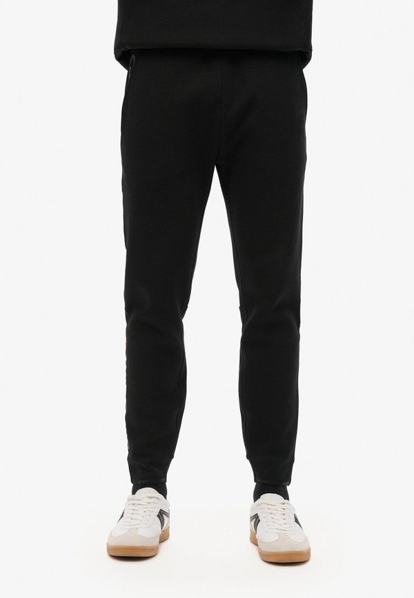 TECH LOGO TAPERED - Jogginghose