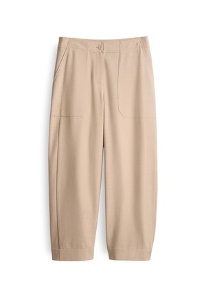 Beige wijduitlopende broek van soepel materiaal, met twee voorzakken en een knoopsluiting. De pijpen lopen iets taps toe bij de zoom.