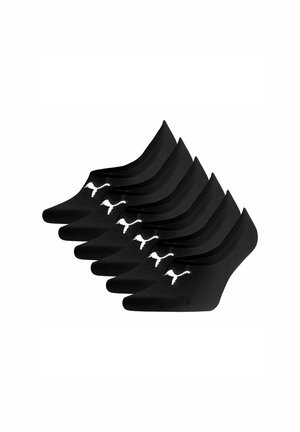 Kuusi paria mustia nilkkasukkia, joissa on valkoinen kissasiluetti-logo, pinottuna viistosti valkoista taustaa vasten.