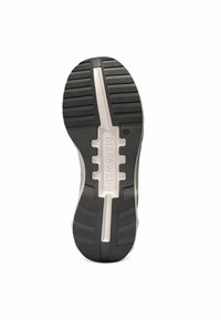 Semelle en caoutchouc noire avec des rainures texturées, semelle intermédiaire blanche et logo "GIESSWEIN" en relief. La forme présente un bout et un talon arrondis.