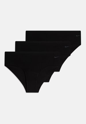 Črne bombažne hlačke, paket treh. Gladek material, brezšivna zasnova, srednji pas, s majhnim sivim logotipom Nike na pasu.