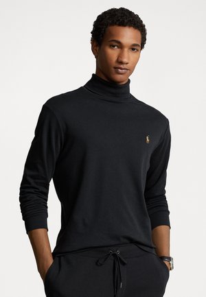 Sweatshirt noir à col roulé avec des manches longues et une coupe ajustée. Présente un petit logo contrastant sur la poitrine et une texture douce.