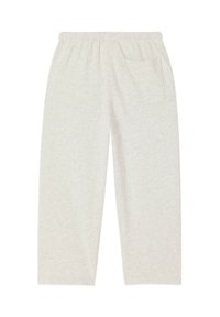 Hele hallid, keskmise tõusuga dressipüksid pehmest kangast, lõdva lõike ja elastse vöökohaga ning ühe tagataskuga.