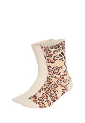 Coppia di calzini a metà polpaccio, uno beige semplice e uno beige con motivo floreale e leopardato marrone, rosso e giallo.