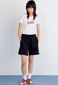 Jordan Pantalon de survêtement - black/white