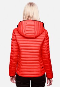 Red padded jacket featuring horizontal quilting, a hood, and black accents on the cuffs and collar. Smooth texture, tailored fit.