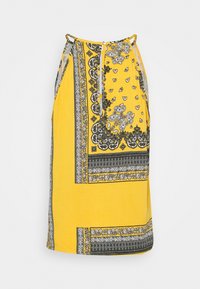 Jupe jaune ornée de motifs paisley et floraux noirs, avec des détails de bordure contrastants. Confectionnée en tissu léger avec un design fluide.