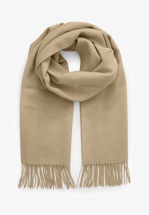 Écharpe en laine beige avec extrémités à franges, pliée en boucle lâche.