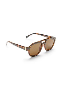 Tortoiseshell sunglasses with brown lenses, featuring a thick frame and a slight cat-eye shape. Accents in yellow-orange tones on the arms.
