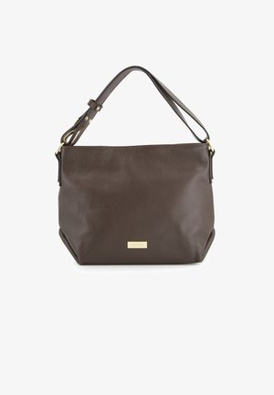 Brown leather shoulder bag with a textured finish, a single strap, and a gold-tone logo accent on the front. Compact and structured shape.