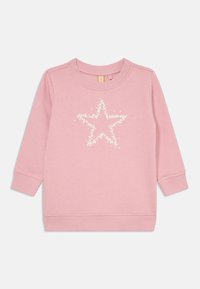 Sudadera rosa con mangas largas, que presenta un diseño de estrella blanca compuesto por pequeñas estrellas en el centro. Tejido suave y puños acanalados.
