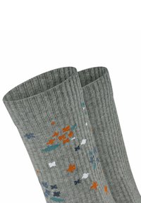 Graue gerippte Socken mit floralen Mustern in Orange, Blau, Weiß und grünen Farbtönen. Texturiertes Gewebe, weiches Material und mittellange Ausführung.