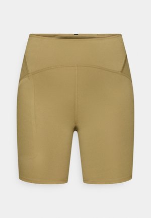 High-waisted shorts in a light olive green, made from stretchy fabric. Features flat seams and a smooth texture without pockets.