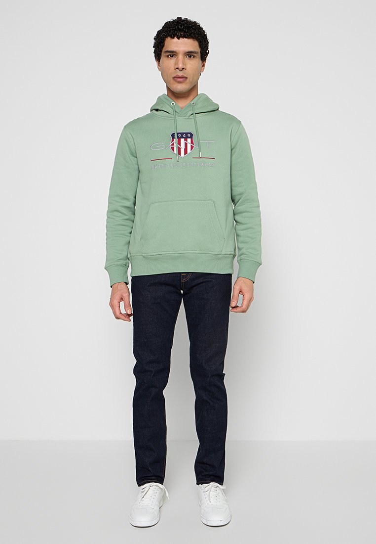 REG ARCHIVE SHIELD HOODIE
