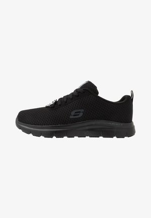 Black athletic shoe with a breathable mesh upper, lace closure, and a cushioned black rubber sole. Features a logo on the side.