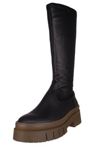 Black knee-high boots made of smooth leather with a chunky brown outsole. Features a round toe and minimalist design with elastic side panels.