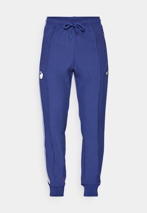 Navy blauwe sweatpants van zacht materiaal, met witte zijkanten, elastische tailleband met trekkoord en logo-detail op het linkerbeen.