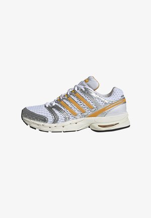 White and silver athletic sneaker with orange stripes, mesh upper, cushioned sole, and lace-up design, viewed from the side on a white background.