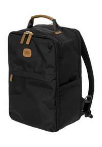 Zaino nero realizzato in tessuto resistente, dotato di manico in pelle marrone, zip dorate e tasche laterali. Design rettangolare con spallacci imbottiti.