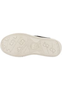 Suela de zapato de goma blanca con un patrón de banda de rodadura texturizado y multidireccional para agarre y tracción. Incluye un logotipo en el centro.