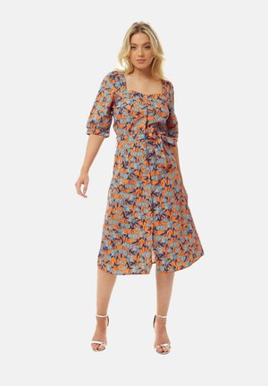 Floral midi dress with orange and blue pattern. Features a square neckline, puff sleeves, and waist tie. Material appears lightweight.