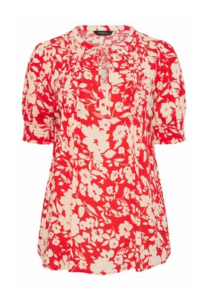 Rote und weiße Bluse mit kurzen Ärmeln und Blumenmuster, mit Kellerfalzen und einer vorderen Knotenbindung am Ausschnitt.