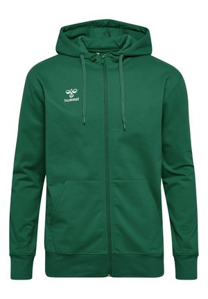 Zielona bluza z zamkiem wykonaną z miękkiego materiału. Posiada kaptur ze sznurkami, przednie kieszenie oraz małe białe logo na klatce piersiowej.