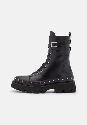 Botki kowbojki i motocyklowe