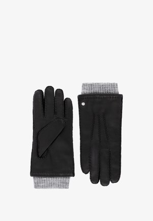 Black leather gloves with gray knit cuffs, one showing palm with thumb patch, the other showing back with decorative stitching and a small metal button.
