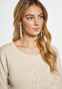 faina Cardigan - elfenbein