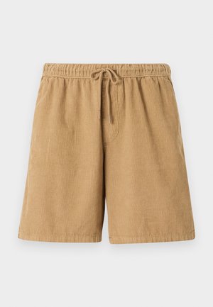 Shorts en velours côtelé marron avec une taille élastique et un cordon de serrage. Présente des côtes verticales et des poches latérales. Longueur courte et design décontracté.