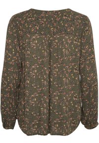 Blouse florale verte à manches longues. Présente de petites fleurs multicolores et un tissu texturé. Coupe décontractée avec un ourlet arrondi.