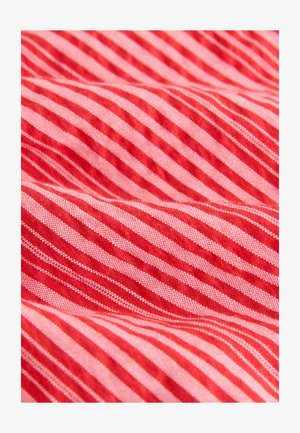 Tessuto a strisce rosse e rosa con strisce orizzontali sottili, dalla consistenza liscia e di peso medio. Le strisce alternano luminosità e larghezza.