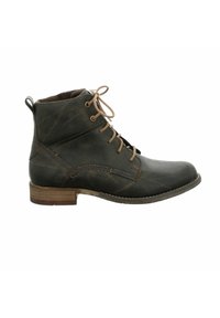Bottine en cuir vert foncé avec des lacets marron, un bout rond, des coutures décoratives et un petit talon en bois. Dispose d'une languette à l'arrière.