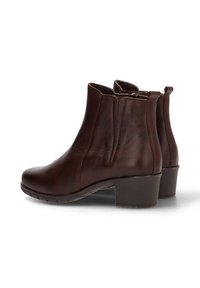 Botines de cuero marrón hasta el tobillo con punta redondeada, tacón bajo en bloque, paneles laterales elásticos y textura suave, con detalles de costura mínimos.