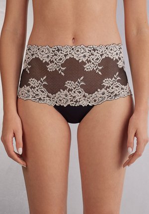 PRETTY FLOWERS - Pants - black