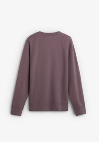 Paarse sweatshirt met lange mouwen, ronde hals en ribgebreide manchetten. Glad materiaal met een minimalistisch ontwerp, voorzien van een rechte zoom.